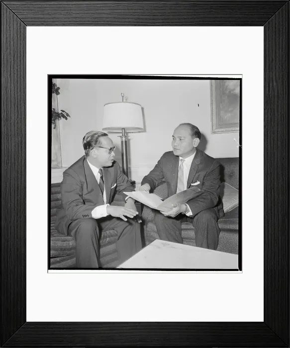 Framed Print : Dr. Subrandrio Conferring with Salvador P. Lopez