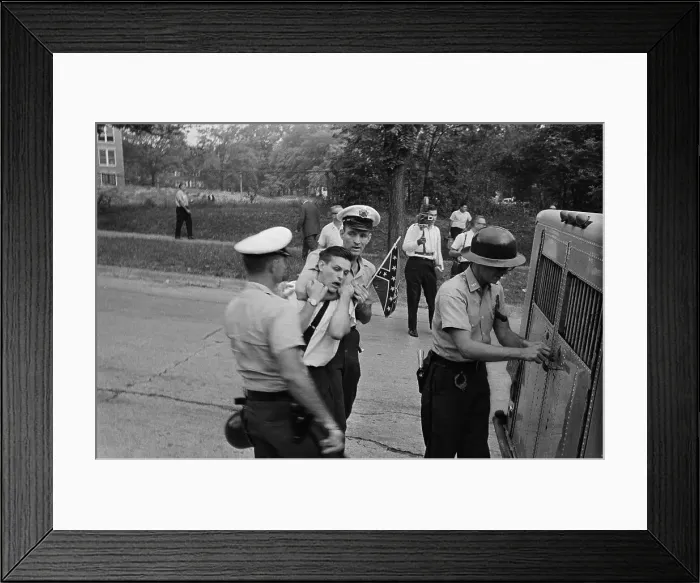 Framed Print : Policemen Taking a Demonstrator into Custody Framed Print : Policemen Taking a Demonstrator into Custody