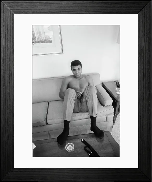 Framed Print : Muhammad Ali Seated on Couch Framed Print : Muhammad Ali Seated on Couch
