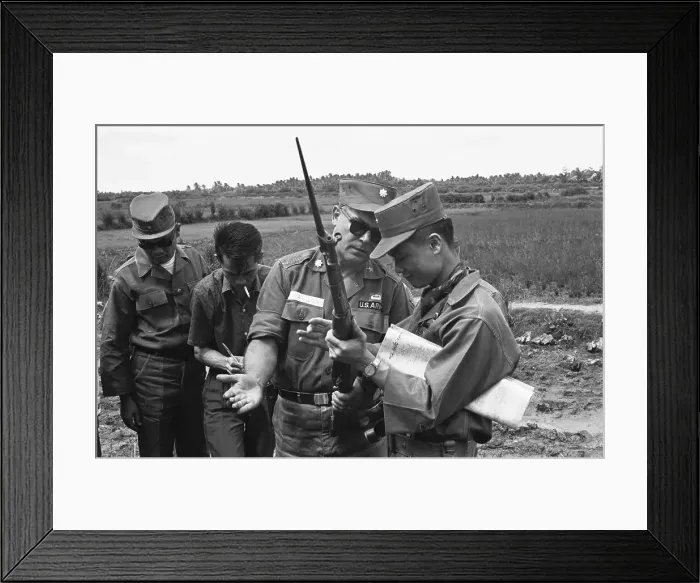 Framed Print : Officers Examining Weapon in Vietnam Framed Print : Officers Examining Weapon in Vietnam