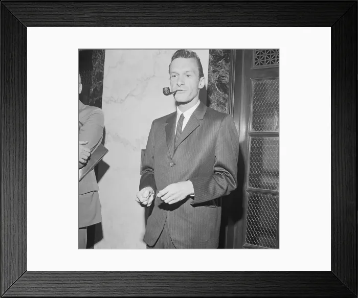 Framed Print : Hugh Hefner Lighting Pipe