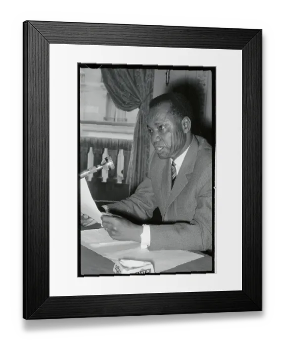 Framed Print : Francois Tombalbaye Holding a Document at News Conference Framed Print : Francois Tombalbaye Holding a Document at News Conference