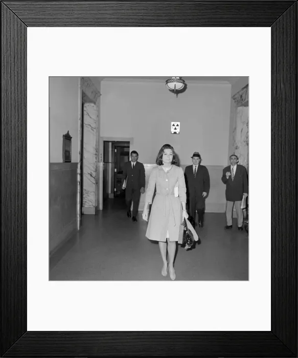 Framed Print : Gloria Steinem Walking down Hallway