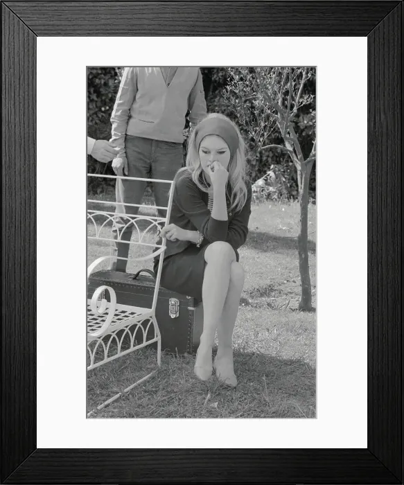 Framed Print : Brigitte Bardot Waiting Between Scenes Framed Print : Brigitte Bardot Waiting Between Scenes
