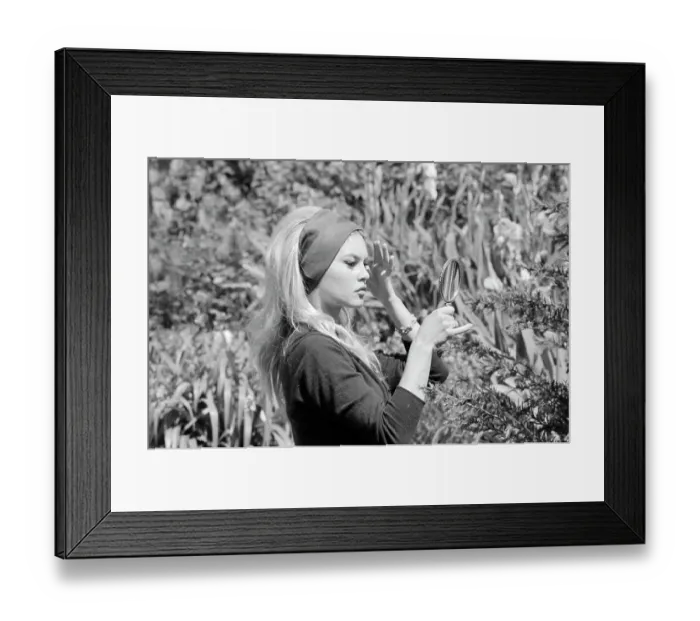 Framed Print : Brigitte Bardot Looking Through Magnifying Glass Framed Print : Brigitte Bardot Looking Through Magnifying Glass