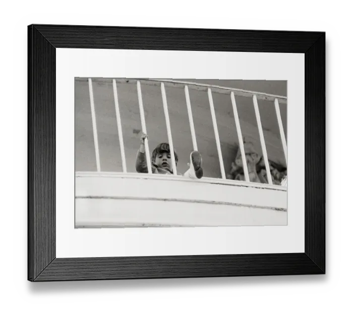 Framed Print : Young John F. Kennedy Jr. Protruding Through Balcony