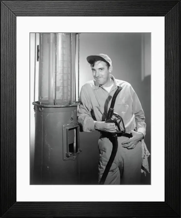 Framed Print : Actor Jim Nabors Holding Gas Station Hose Framed Print : Actor Jim Nabors Holding Gas Station Hose