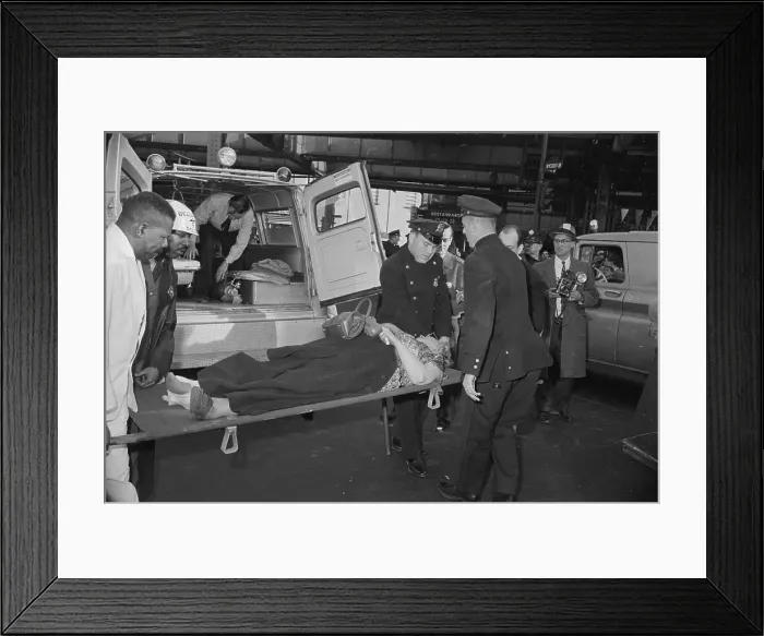 Framed Print : Woman Being Cared for at Ambulance Scene Framed Print : Woman Being Cared for at Ambulance Scene