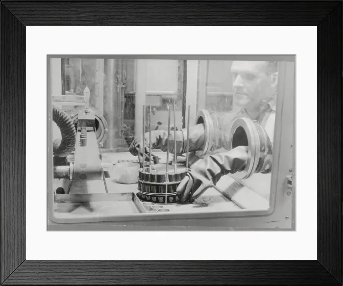 Framed Print : Protected Technician Working with Uranium