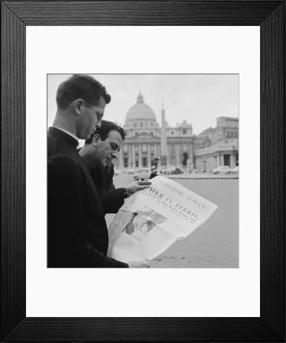 Framed Print : Priest Reading Newspaper Framed Print : Priest Reading Newspaper
