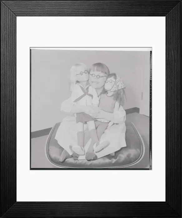 Framed Print : Girl Posing with Dolls Framed Print : Girl Posing with Dolls
