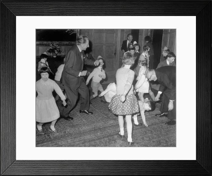 Framed Print : Jean Paul Getty Dancing with Children Framed Print : Jean Paul Getty Dancing with Children