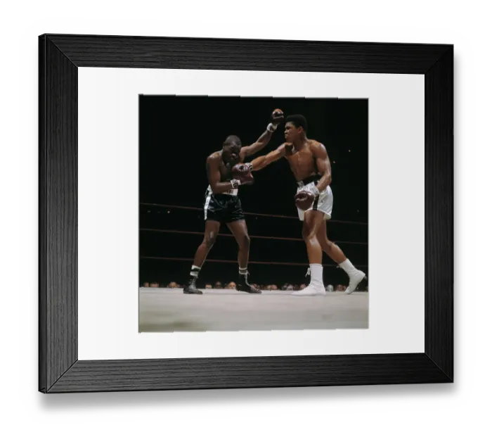 Framed Print : Cassius Clay Hitting Doug Jones During Fight Framed Print : Cassius Clay Hitting Doug Jones During Fight