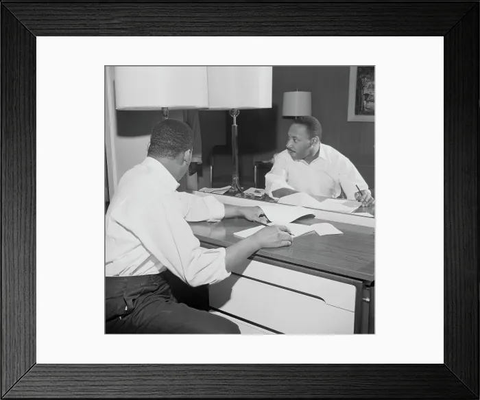 Framed Print : Martin Luther King Sitting at a Hotel Desk Framed Print : Martin Luther King Sitting at a Hotel Desk