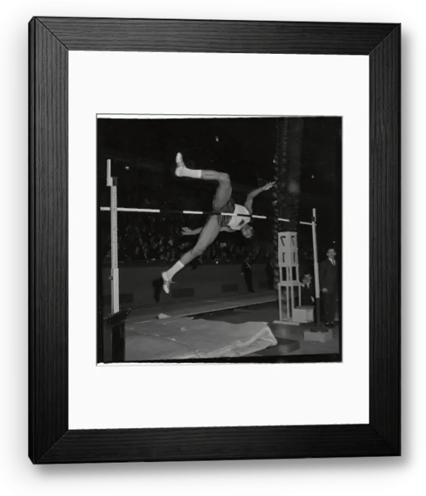 Framed Print : Olympian John Thomas Jumping Over High Bar Framed Print : Olympian John Thomas Jumping Over High Bar