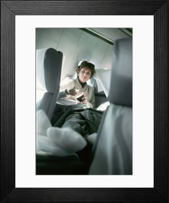 Framed Print : Helen Klaben Relaxing Aboard an Airplane Framed Print : Helen Klaben Relaxing Aboard an Airplane