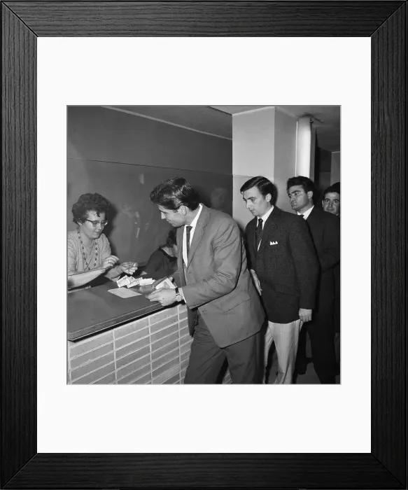 Framed Print : Guest Worker Converting His Marks into Lire Framed Print : Guest Worker Converting His Marks into Lire