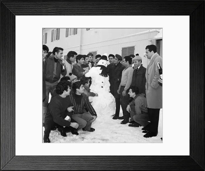 Framed Print : Guest Workers Building Snowman Framed Print : Guest Workers Building Snowman