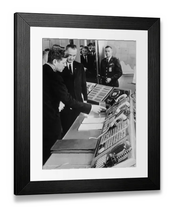 Framed Print : Examining Communications Equipment Framed Print : Examining Communications Equipment