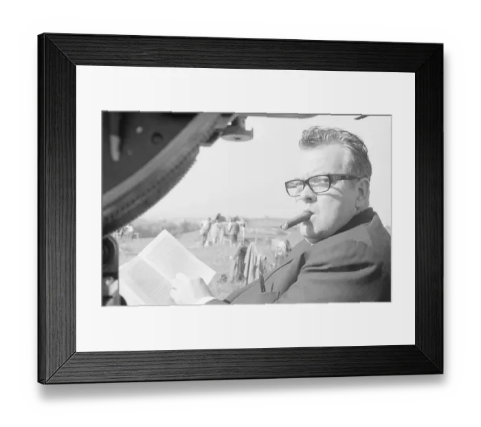 Framed Print : Orson Welles Smoking Cigar on Film Set