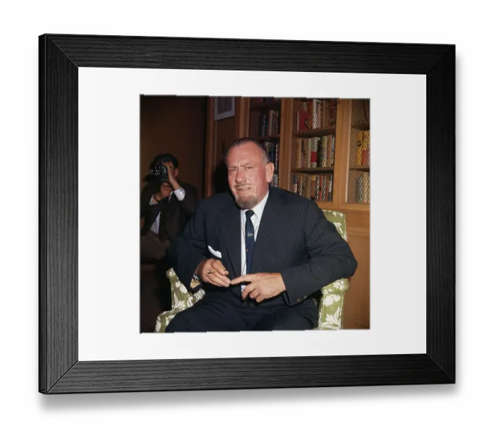 Framed Print : Author John Steinbeck near Bookshelf Framed Print : Author John Steinbeck near Bookshelf