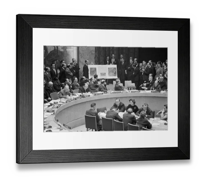 Framed Print : Security Council Delegates Examining Photographs Framed Print : Security Council Delegates Examining Photographs