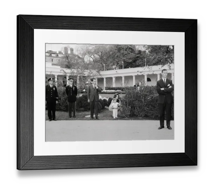 Framed Print : Jacqueline Bouvier Kennedy Stooping in Garden with John Fitzgerald Kennedy Jr