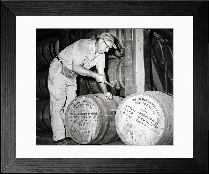 Framed Print : Distiller Plugging Whiskey Barrel Framed Print : Distiller Plugging Whiskey Barrel