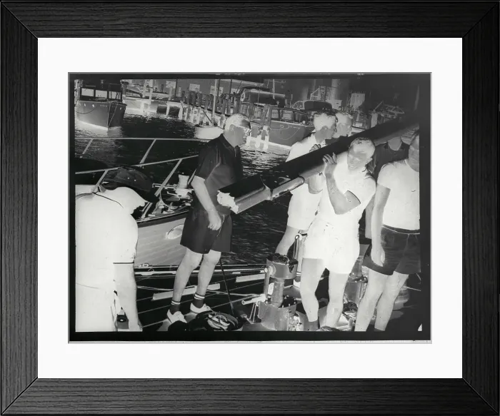 Framed Print : Men Carrying Boom Near Boat Dock Framed Print : Men Carrying Boom Near Boat Dock