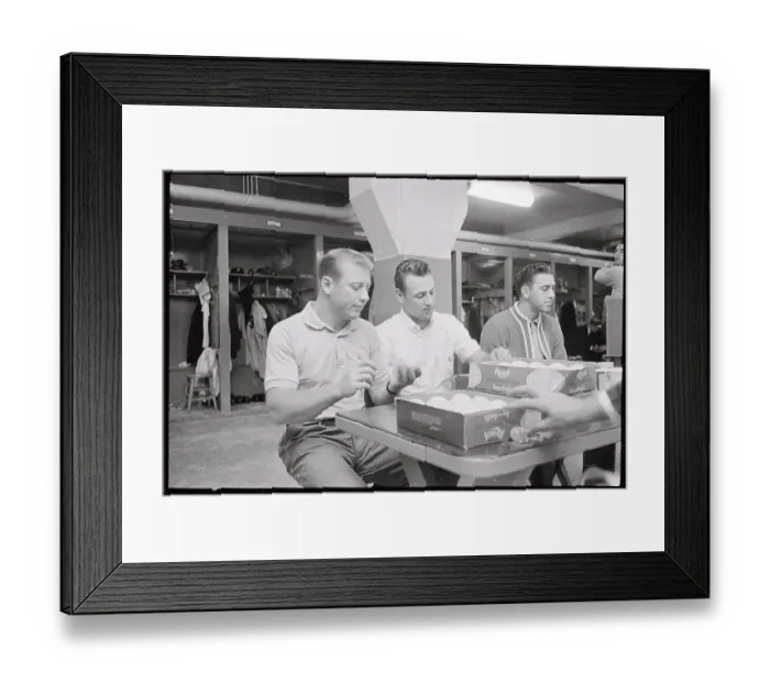 Framed Print : Baseball Players Taking it Easy During Game Postponement
