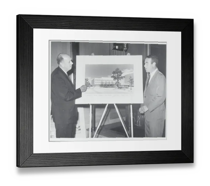 Framed Print : Men Discussing New Building Framed Print : Men Discussing New Building