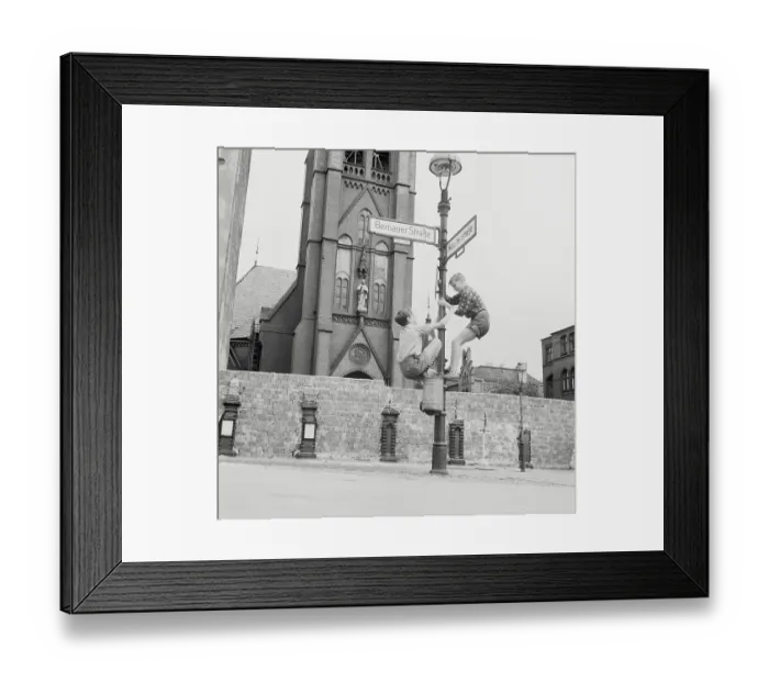 Framed Print : Boys Climbing a Light Post Framed Print : Boys Climbing a Light Post