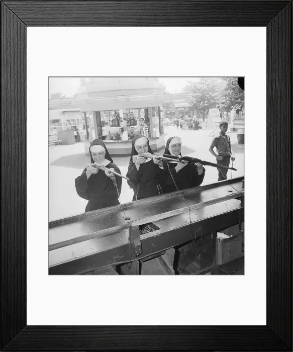 Framed Print : Nuns Shooting at Bullseye Framed Print : Nuns Shooting at Bullseye