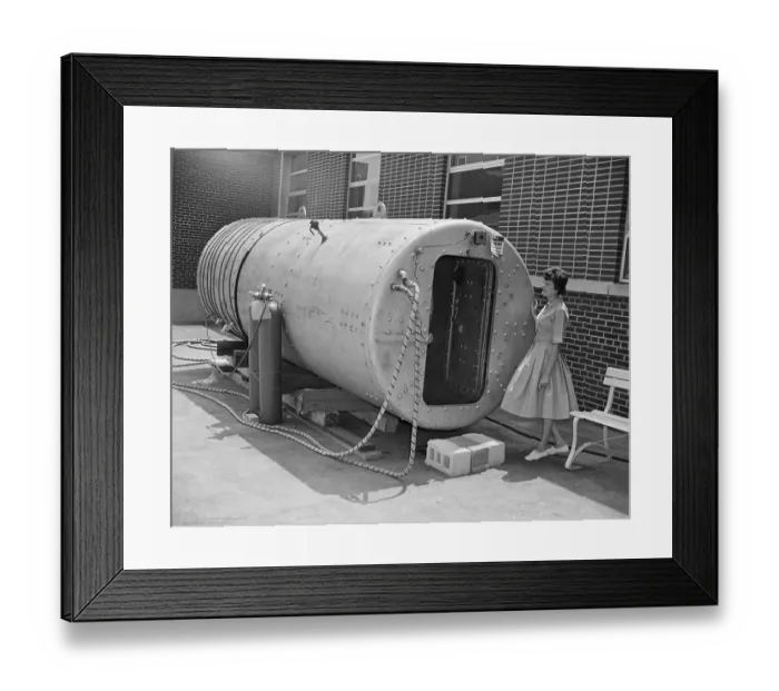 Framed Print : Woman Looking Over Compression Tank Framed Print : Woman Looking Over Compression Tank