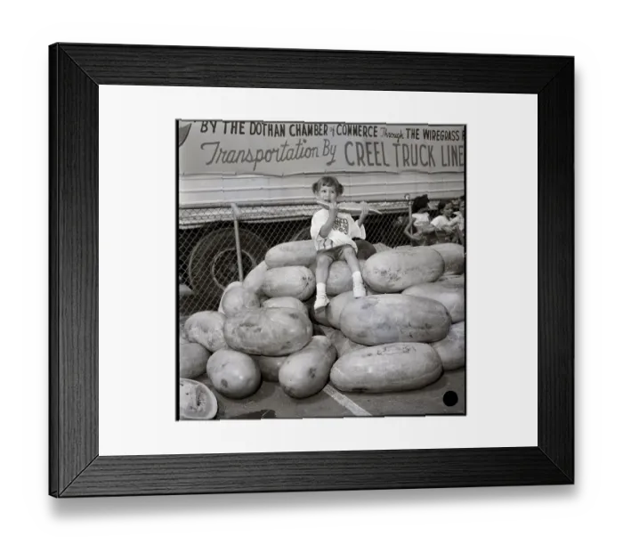 Framed Print : Child Sitting On Top Of Watermelon Pile