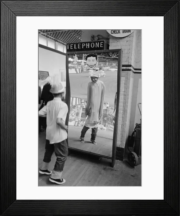 Framed Print : Boy Looking at Himself in a Distorted Mirror at Steeplechase Park in Coney Island Framed Print : Boy Looking at Himself in a Distorted Mirror at Steeplechase Park in Coney Island