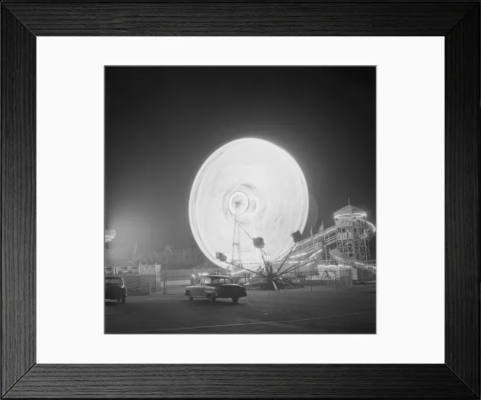 Framed Print : Spinning Ferris Wheel