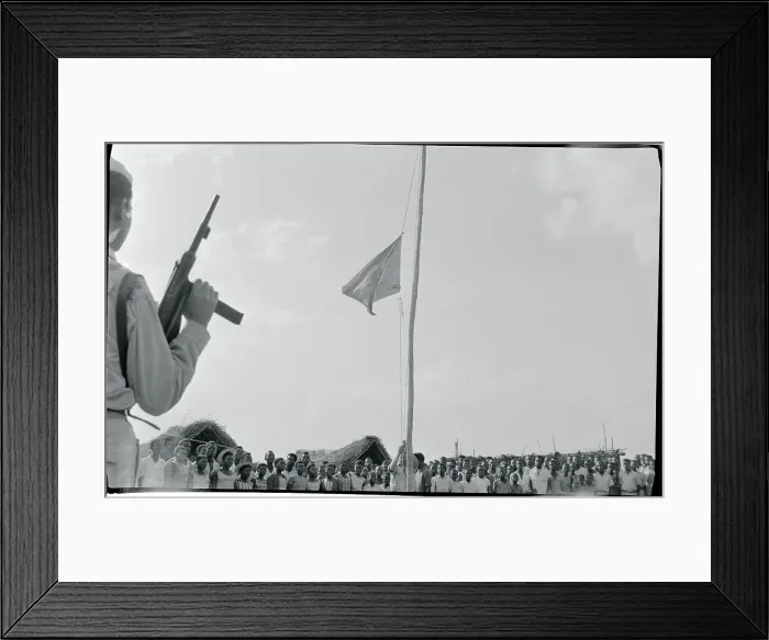 Framed Print : Soldier Holding Weapon at Encampment Framed Print : Soldier Holding Weapon at Encampment