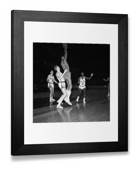 Framed Print : Wilt Chamberlain Jumping Holding Ball