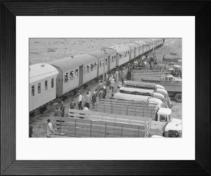 Framed Print : Passengers and Transport Trucks at Train Station Framed Print : Passengers and Transport Trucks at Train Station