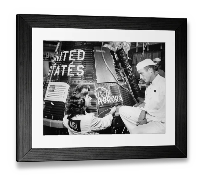 Framed Print : Woman Paints Name on Spaceship Framed Print : Woman Paints Name on Spaceship