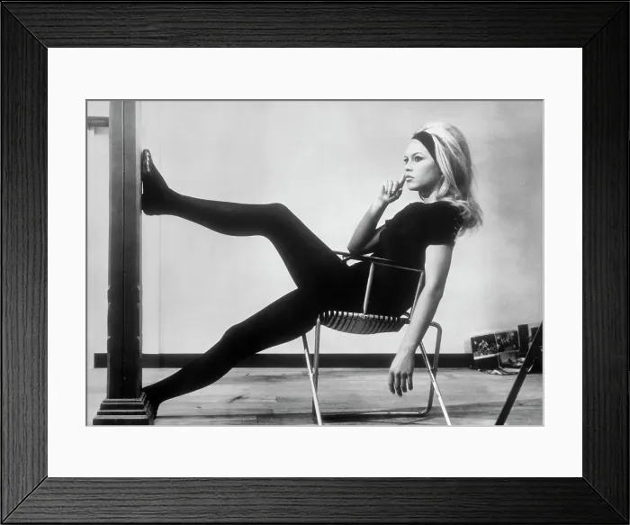 Framed Print : Brigitte Bardot Relaxing Between Scenes