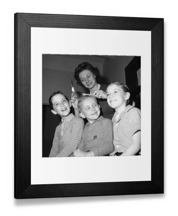 Framed Print : Woman Cutting Boys Hair at Home Framed Print : Woman Cutting Boys Hair at Home