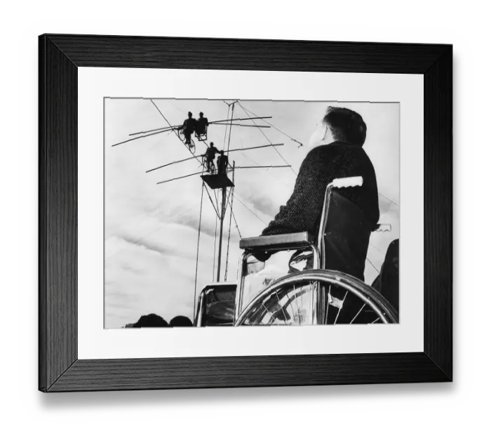 Framed Print : Wallendas. Crippled Mario Wallenda, 22, watches Framed Print : Wallendas. Crippled Mario Wallenda, 22, watches