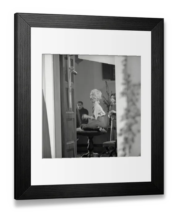 Framed Print : French Actress Brigitte Bardot Sitting on Table Framed Print : French Actress Brigitte Bardot Sitting on Table