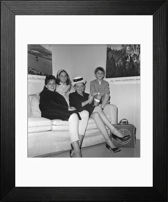 Framed Print : Judy Garland and Her Children Waiting in Airport Framed Print : Judy Garland and Her Children Waiting in Airport
