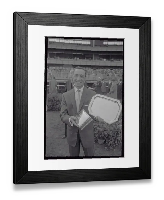 Framed Print : Eddie Arcaro Holding Silver Trophies Framed Print : Eddie Arcaro Holding Silver Trophies