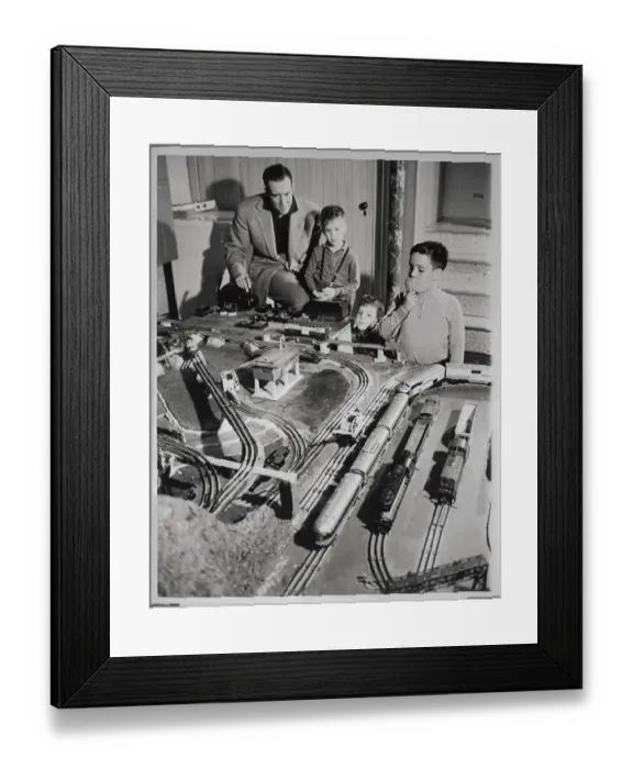 Framed Print : Father and Sons with Model Train Set Framed Print : Father and Sons with Model Train Set