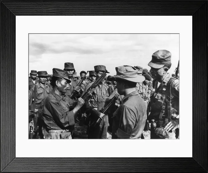 Framed Print : Linton Beasley Checking Rifle Squad