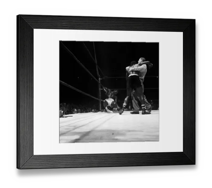 Framed Print : Referee Holds Boxer Back, Other Sags On Ropes Framed Print : Referee Holds Boxer Back, Other Sags On Ropes